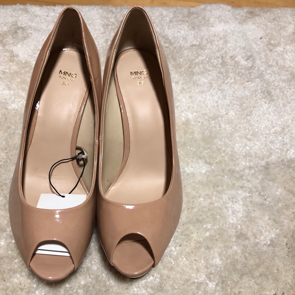 Nude open toe pumps